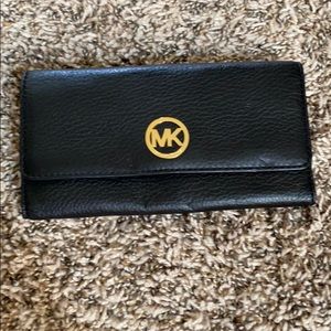 Leather Michael Kors wallet.